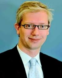 Non-equilibrium assembly of microtubules: from molecules to autonomous  chemical robots