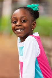 Outdoor Close Up Portrait of a Cute Young Black Girl