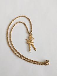 Vintage 70s Avon Dancing Ballerina Necklace Pendant Charm 1977 Gold Tone Little Girl Dancer Moveable Leg Arm Ballerina Necklace Avon Jewelry Vintage Jewelry