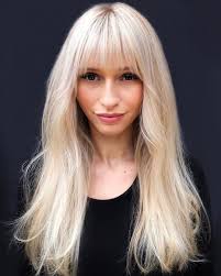 Go full blonde with this platinum bob that looks icy and beautiful. 23 Perfectly Flattering Long Hairstyles With Bangs Stylesrant
