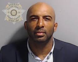 Georgia judge denies bid to revoke Trump co-defendant Harrison Floyd's bond  over social media posts