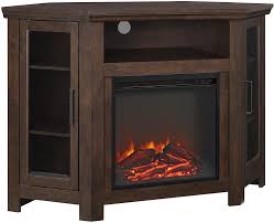 The pine finish with antique black hardware has a nice, rustic feel, creating a vessel for an electric fireplace that still feels homey and quaint. Amazon Com Walker Edison Alcott Classic Glass Door Fireplace Corner Tv Stand For Tvs Up To 55 Inches 48 Inch Traditional Brown Furniture Decor