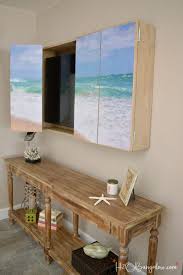 So before you select a bifold door, first measure the actual width of your tv. Diy Wall Mounted Tv Cabinet With Free Plans H2obungalow