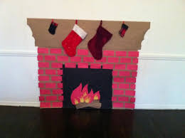 Download free poster templates and customize the poster to meet your needs easily. How To Make A Fake Fireplace Out Of Paper Diy Christmas Fireplace Christmas Fireplace Decor Christmas Fireplace
