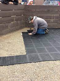 In fact, this is the same material used for the interlocking garage floor tiles which are designed to hold large vehicles such as suvs and large trucks. Rubber Staylock Perforated Deck Tile Outdoor Outdoor Rubber Flooring Playground Flooring Rubber Flooring