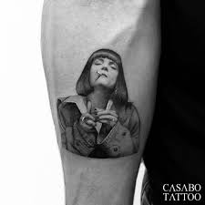 Japanese tattoo designs of the name wallace written vertically in katakana. Mia Wallace
