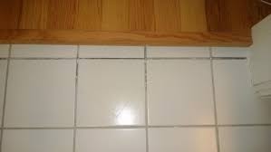 Regrouting Bathroom Tile Orbited By Nine Dark Moons