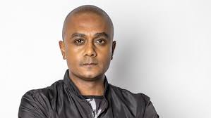 SABC: Nigel Pierce's 'breach of contract' resulted in 'immediate  termination'