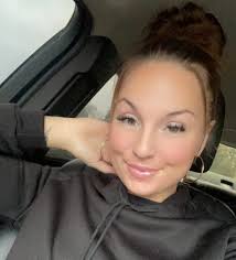 Sweatpants, hair tied, chillin with no makeup