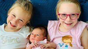 Family gets unexpected diagnosis day after third daughter is born