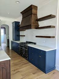 Farmhouse Kitchen With Open Shelving Painted Blue Cabinetry White Subway Tile Backspl Farmhouse Kitchen Backsplash Blue Kitchen Cabinets Open Kitchen Shelves