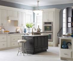 White up top with a wooden island and other splashes of wood textures keep it feeling light and airy. Off White Kitchen Cabinets Dark Grey Island Diamond