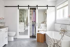 Barn doors are specially hung doors with clear or textured glass or solid doors that slide on a horizontal track mounted flat to the surface of the wall. Master Bathroom Barn Door Design Ideas