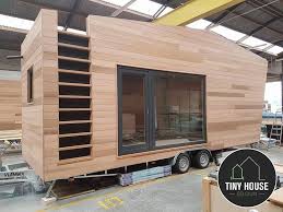 Follow our pinterest for tiny house design ideas for living rooms, bedrooms, lofts, bathrooms, and much become a dream big live tiny member! A Sleek Modern Tiny House On Wheels Designed By Tiny House Belgium For The Pop Up Hotel Tiny House Exterior Modern Tiny House Tiny Mobile House
