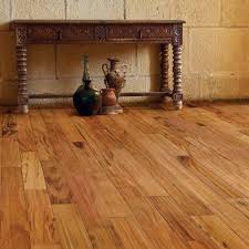 Hand scraped wood is a popular rustic flooring material that takes the natural, luxurious beauty of solid hardwood and transforms it into something modern and unique. Indusparquet 1 2 X 5 Hand Scraped Tigerwood Engineered Hardwood Flooring