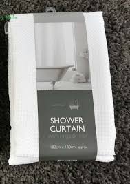 A shower curtain that feels custom made. White Waffle Shower Curtains