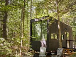 For the diy, we also offer building exterior finished only (or shell) cabins for tennessee and other states as well (trucking rates will apply). Tiny Rental Cabins Pop Up On Big Wooded Site In Texas Hill Country Culturemap Austin