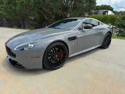 Image result for Titanium Silver 2014 Aston Martin