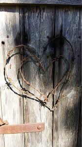 Barbed wire, razor wire, barbed wire fence and razor wire fences are as common using security fences in agriculture, animal feeding, war protection and as parts of fences. Barbed Wire Heart Rusted Wire Decor Set Rusty Metal Heart Barb Wire Art Rustic Home Decor Wedding De Barbed Wire Art Barbed Wire Decor Wire Art