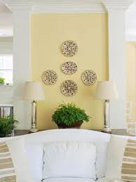 25 Cheery Ways To Use Yellow In Your Decor Yellow Walls Living Room Yellow Accent Walls Yellow Home Decor