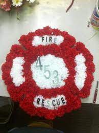 Family owned funeral florist shop. Maltese Firefighter Cross Firefighter Cross Funeral Arrangements Funeral Flowers