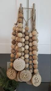 Long Farmhouse Natural Wooden Bead Garland With Custom End Etsy In 2021 Wooden Bead Garland Wood Beads Diy Beaded Garland