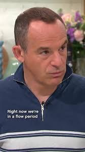 Martin Lewis Showing Her How to Make Mo Ey