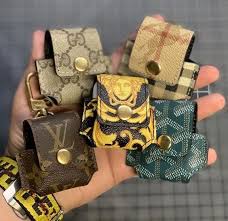 Carry Your Apple Airpods Case In Nothing But Style Versace Gucci Louisvuitton Burberry Goyard Airpod Airpo In 2020 Louis Vuitton Louis Vuitton Handbags Vuitton