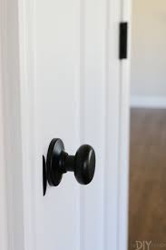 Update Your Doors White Craftsman Style The Diy Playbook White Interior Doors Craftsman Style Doors Black Interior Doors