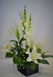 Send flowers online from flower shop for your loved ones and avail for corporate gifting with it's instant same day delivery. Wonderful In Black And White Fresh Flower Arrangement In Holland Mi Glenda S Lakewood Flowers