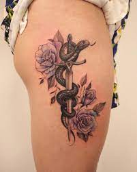 Snake And Color Roses With Sword Hon Tattoo Flower Thigh Tattoos Rose Tattoos For Women Snake Tattoo Design