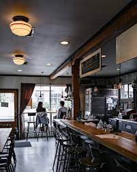Happy Hour Thetannerybar In Portland Looks Especially Cozy Thanks To The Warm Glow Of Our Thurman 6in Fl Restaurant Interior Design Industrial Style Home Home