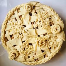 Caramel Apple Pie Decorated With Roses Simple Five Petal Flowers And Vines Atop A Simple Lattice Decorative Pie Crust Creative Pie Crust Pie Crust Art