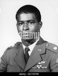 United States Air Force Major Chris Veronin, Space Warfare Center,  Schriever Air Force Base, Colorado, shows the unique capabilities of the  HyperSpectral Imaging (HSI) sensor system to Colonel Robert Ryals, Deputy  Commmander,