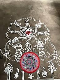 The design here in the center is the common pongal design of the sweet pot but surrounding it we see many pulli kolam designs. Kolam Wikipedia