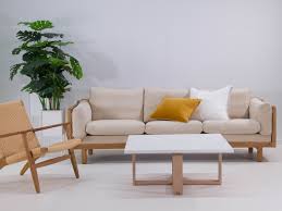 It is made out of marble and its wooden legs make it look stylish. Zoe Square Coffee Table Satara