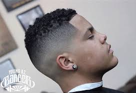 There is a contrast between the curly top and shaved temples that create a very original look. Curly Skin Fade Haircut Short Novocom Top