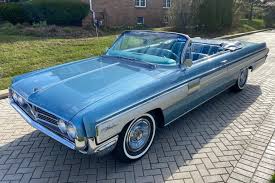 Image result for Sahara Mist 1962 Oldsmobile