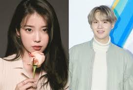 As the clock struck 6 p.m. Iu Suga S Collaboration Song Eight Becomes Chart Sensation