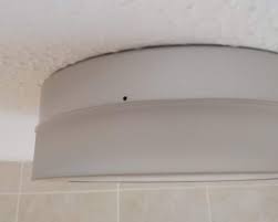 How Can I Open This Bathroom Light Fixture With An Arrow And Tiny Hole Asonia Round Brushed Home Improvement Stack Exchange