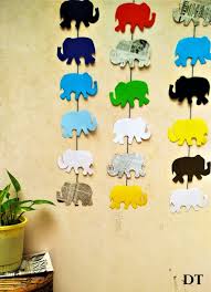 A cheerful cow treads across a meadow, consuming dewy grass for breakfast as the delicate crimson sun dances over the horizon. Top 5 Easy Diy Wall Hangings Using Paper Diarytale