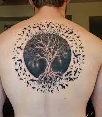 In Tattoo Art A Tree Symbolizes Life And Every Part Has A Deep Meaning The Roots Signify The Stron Tattoos For Guys Tree Of Life Tattoo Back Tattoos For Guys