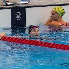 How old was jacoby when she started swimming? H Dwan64qolwsm