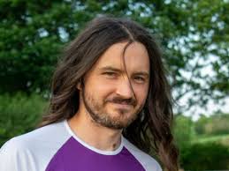 Long-haired man cuts his locks for charity and will walk 50 miles to donate  it