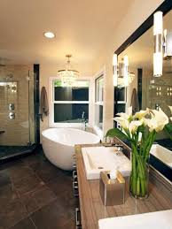 Learn how designers take bathrooms from blah to brilliant with the use of chandeliers, decorative wall sconces, perimeter and recessed lighting. Amazing Bathroom Lighting Ideas Unique Blog