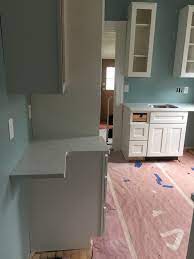 This isn't that unusual in many kitchens, especially in older homes with foundations that have settled. Trimming Out Base Cabinet On Unlevel Floor