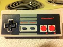 It's created by etsy seller bohemianworkshop and is a work of art. Nes Controller Coffee Table Others