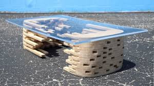 Sometimes i think i sub here because of the disasters more than the cool stuff like this table. Man Builds Exploded Pixel Coffee Table From A Single Sheet Of Plywood
