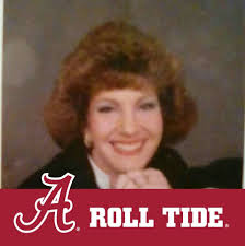 When to cut back climbing red rose bushes?