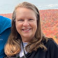 Who are the people in the 50-year reunion photo?